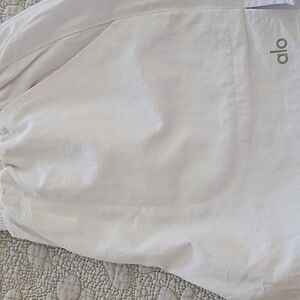 Alo Yoga white shorts with pockets. Size small.